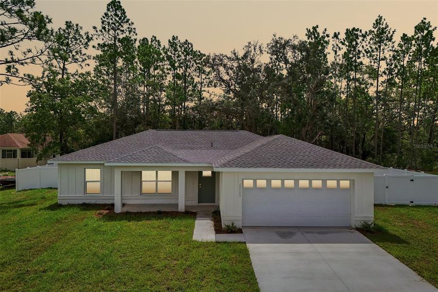 Front exterior of a new home in , Ocala, FL, highlighting curb appeal (Image 21).