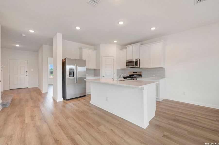 Furnished interior view inside a new home in Hickory Ridge Estates, Elmendorf (Image 14).