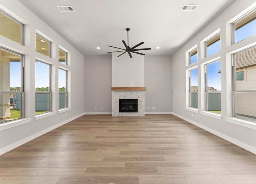 Great Room/Family Room Open to the Kitchen with Lots of Natural Light Overlooking Both Patios Great Room/Family Room Open to the Kitchen with Lots of Natural Light Overlooking Both Patios