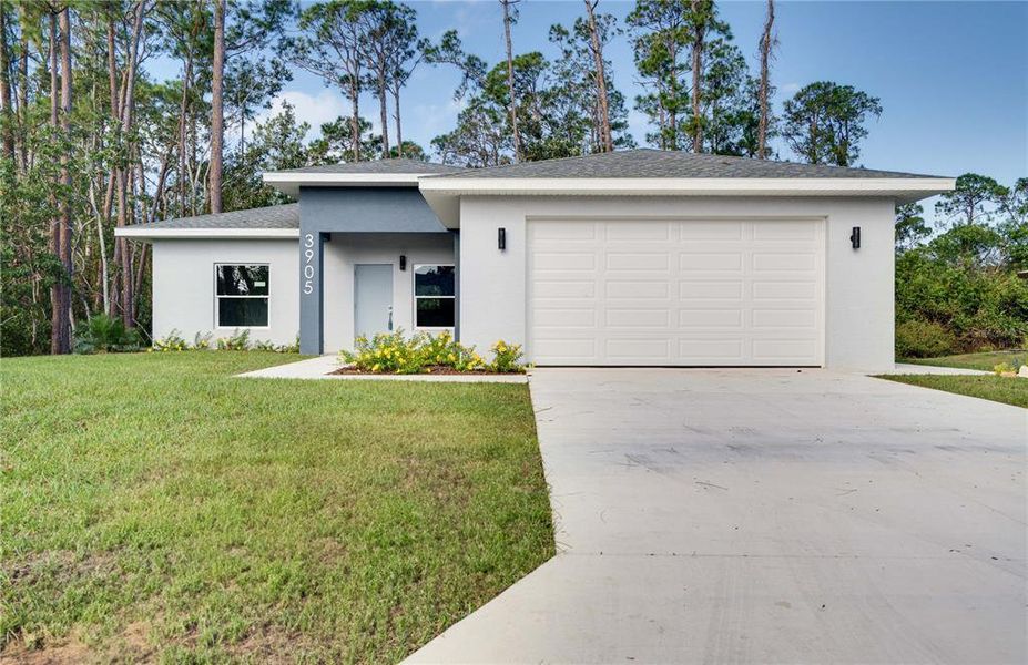 Front exterior of a new home in , Sebring, FL, highlighting curb appeal (Image 1). Front exterior of a new home in , Sebring, FL, highlighting curb appeal (Image 1).