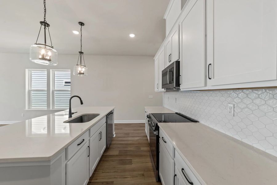 Furnished interior view inside a new home in Blue Heron Retreat, Little River (Image 7).