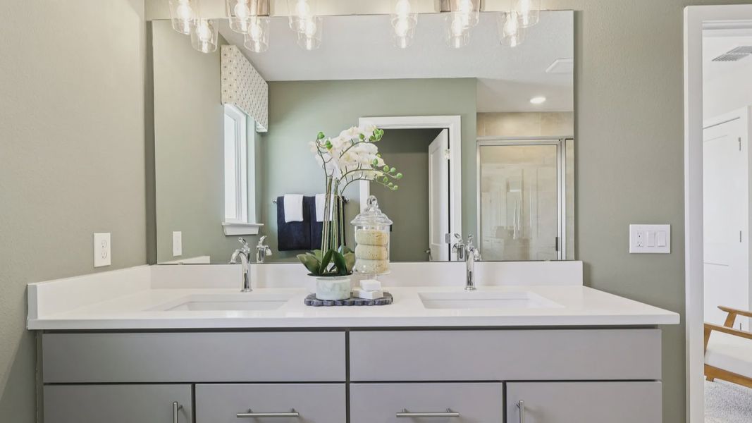 The Mangrove Model Primary Bath with Dual Sinks at Lakeside at Satilla by DRB Homes in Saint Cloud, FL The Mangrove Model Primary Bath with Dual Sinks at Lakeside at Satilla by DRB Homes in Saint Cloud, FL