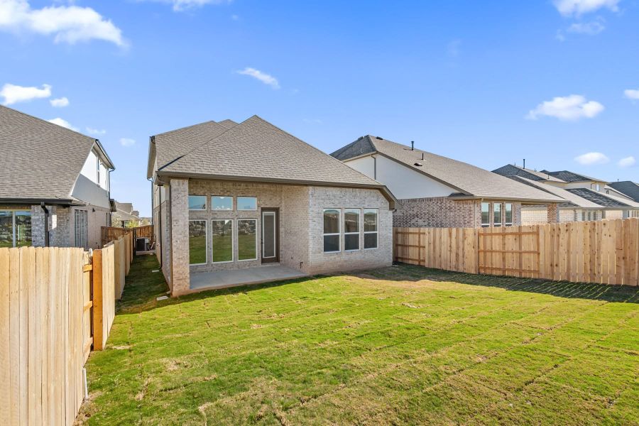 Exterior details and patio area of a home in Flora, Hutto (Image 26).