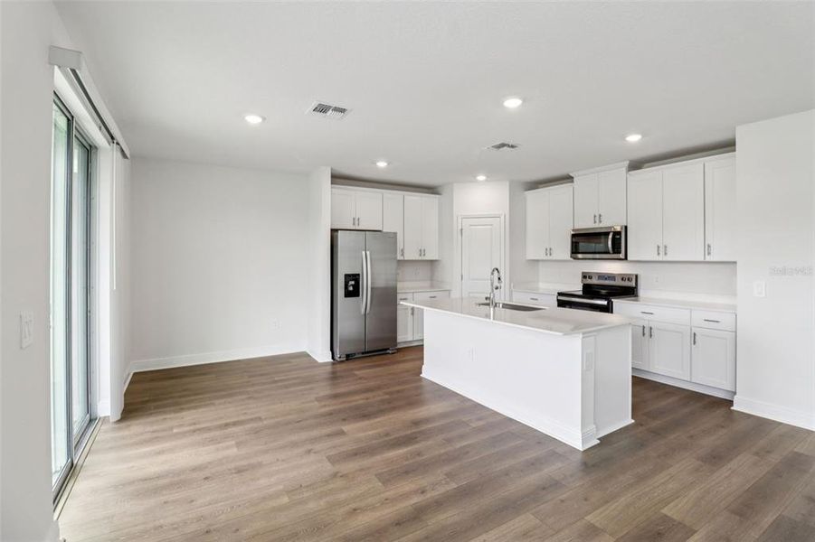 Furnished interior view inside a new home in The Reserve at Hammock Oaks - Classic Series, Lady Lake (Image 10). Furnished interior view inside a new home in The Reserve at Hammock Oaks - Classic Series, Lady Lake (Image 10).