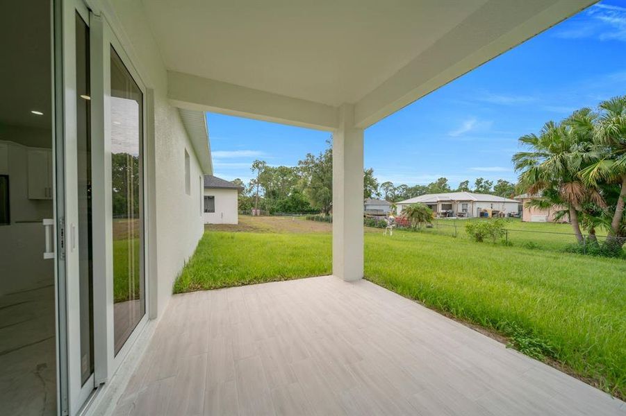 Exterior details and patio area of a home in , Lehigh Acres (Image 3).