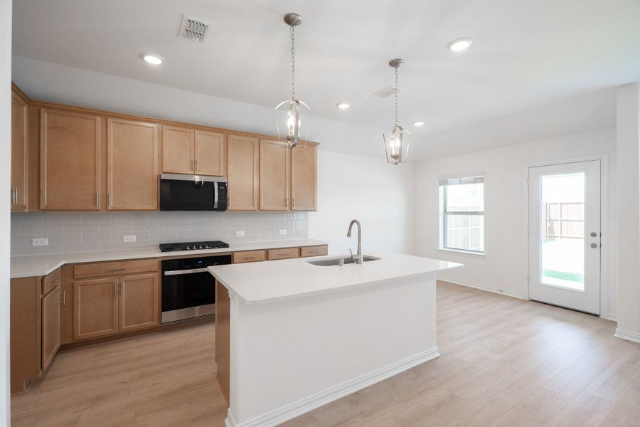 Furnished interior view inside a new home in Lake Pointe, Little Elm (Image 5).