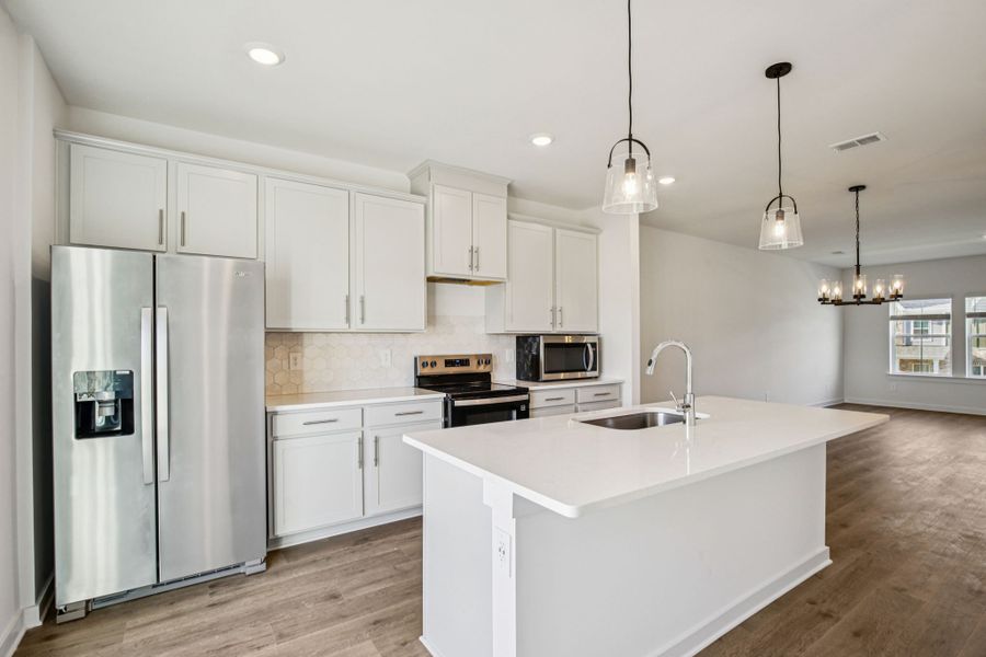Furnished interior view inside a new home in Greystone - Highland Townhomes, Smyrna (Image 6).