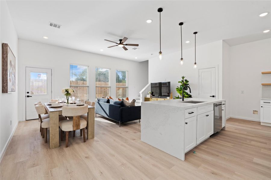 First look at the open main floor — living, dining, and kitchen designed to feel connected and welcoming. First look at the open main floor — living, dining, and kitchen designed to feel connected and welcoming.