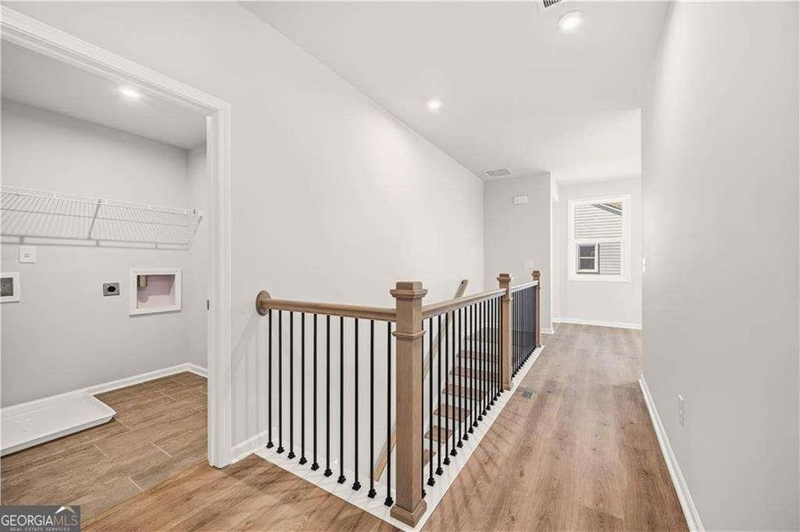 Spacious, unfurnished interior of a new home in The Paddocks at Doc Hughes, Buford (Image 27).
