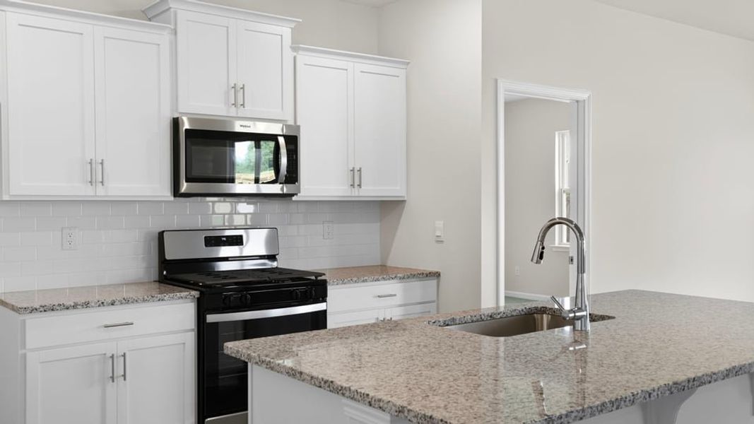 Furnished interior view inside a new home in Durbin Meadows Traditions, Fountain Inn (Image 7). Furnished interior view inside a new home in Durbin Meadows Traditions, Fountain Inn (Image 7).