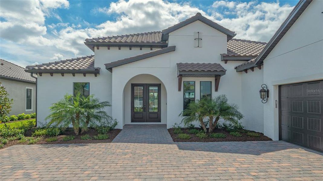 Front exterior of a new home in , Englewood, FL, highlighting curb appeal (Image 22).