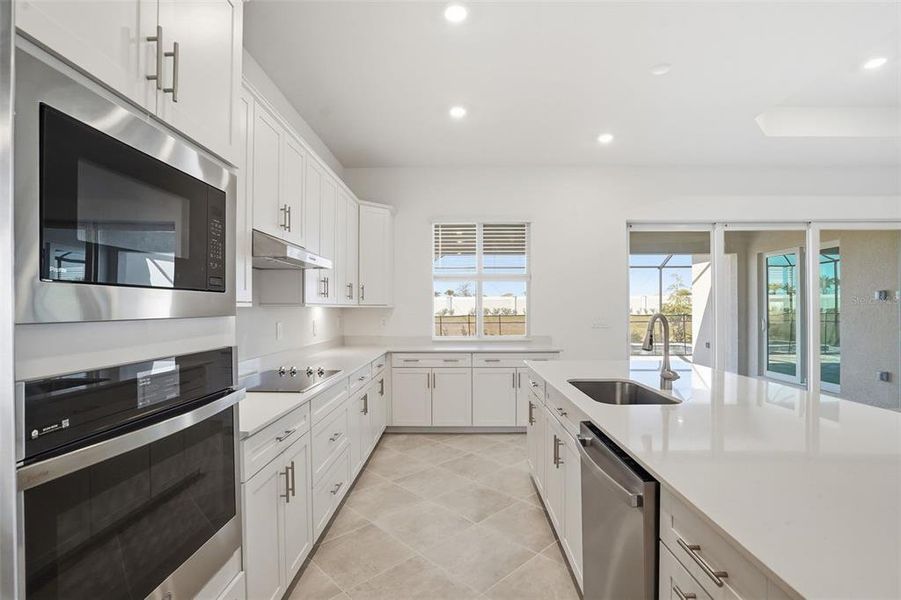 Furnished interior view inside a new home in Wellen Park Golf & Country Club, Venice (Image 7).