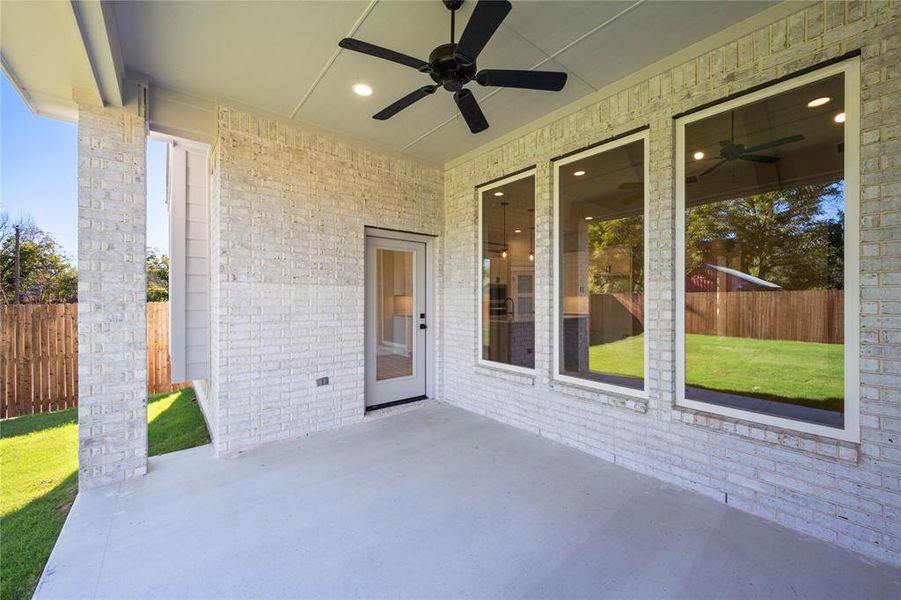 View of patio with ceiling fan