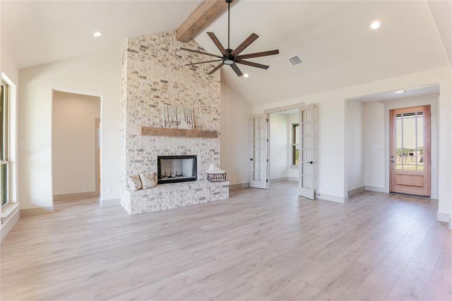 View from the living area into the front office and foyer. View from the living area into the front office and foyer.