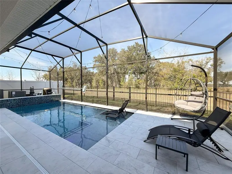 Exterior details and patio area of a home in , Minneola (Image 4).