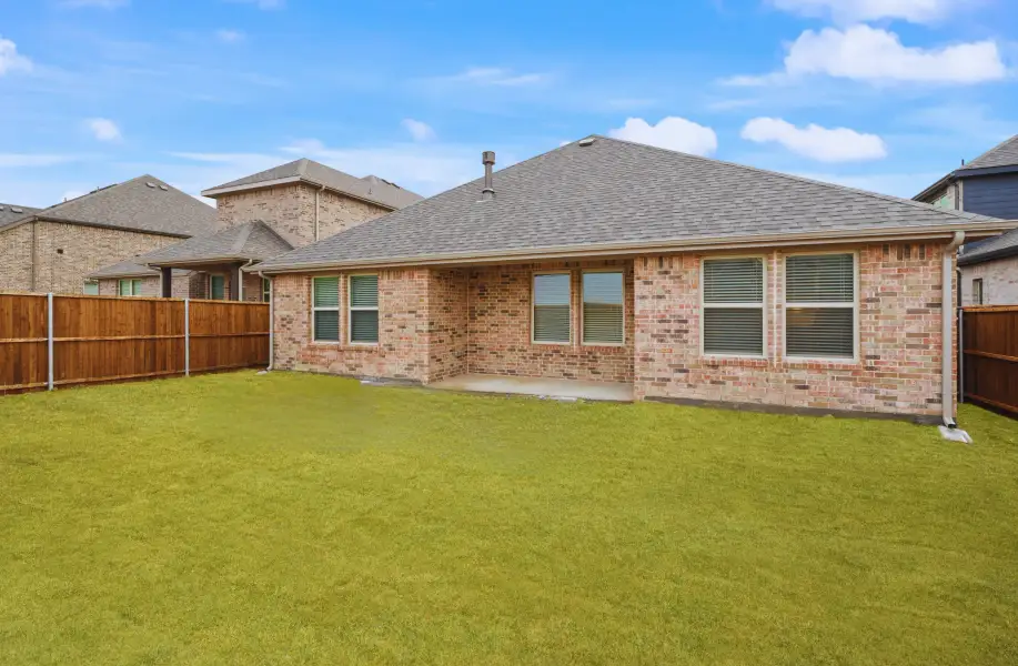 Exterior details and patio area of a home in Brookville Estates, Forney (Image 2).