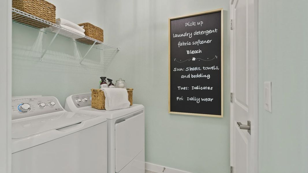 Castaway Model well appointed laundry room off of the garage, new home plan available at Liberty Trace in Haines City, fl