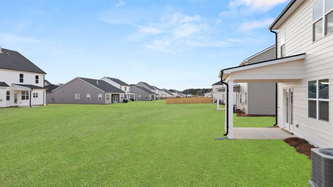 Front exterior of a new home in Estates at Deer Hollow, Grovetown, GA, highlighting curb appeal (Image 27).