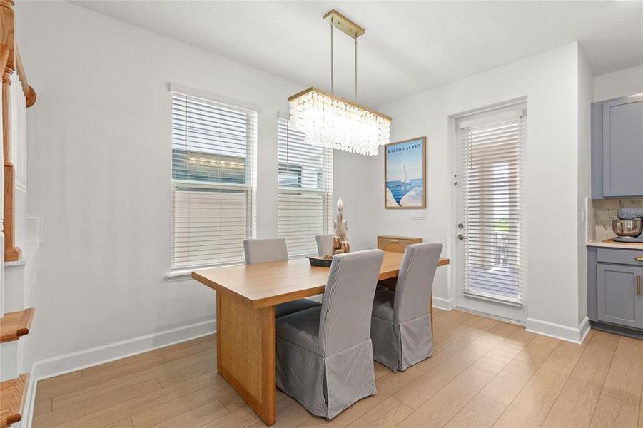 Furnished interior view inside a new home in Harvest at Ovation, Winter Garden (Image 10).