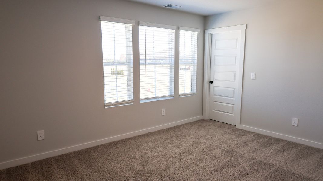 Representative unfurnished interior of a home built from the EMBRY by D.R. Horton in Harvest Point, Spring Hill (Image 44).