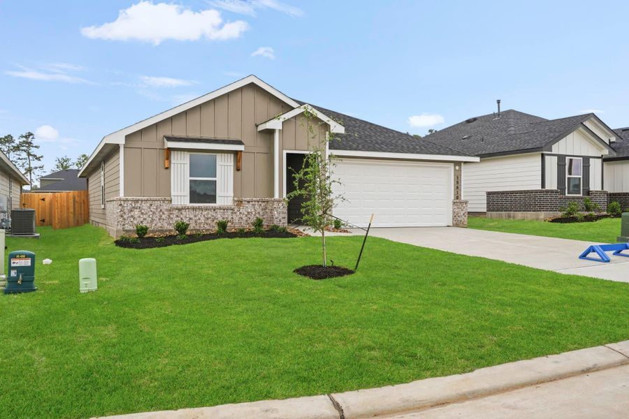 Front exterior of a new home in Chapel Lakes, Montgomery, TX, highlighting curb appeal (Image 17).