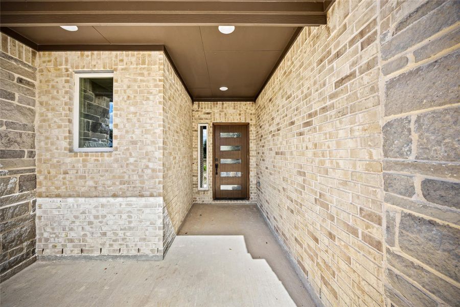 Exterior details and patio area of a home in , Prairie View (Image 4). Exterior details and patio area of a home in , Prairie View (Image 4).