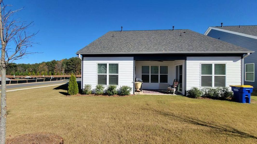 Exterior details and patio area of a home in The Reserve at Bells Ferry, Kennesaw (Image 28).