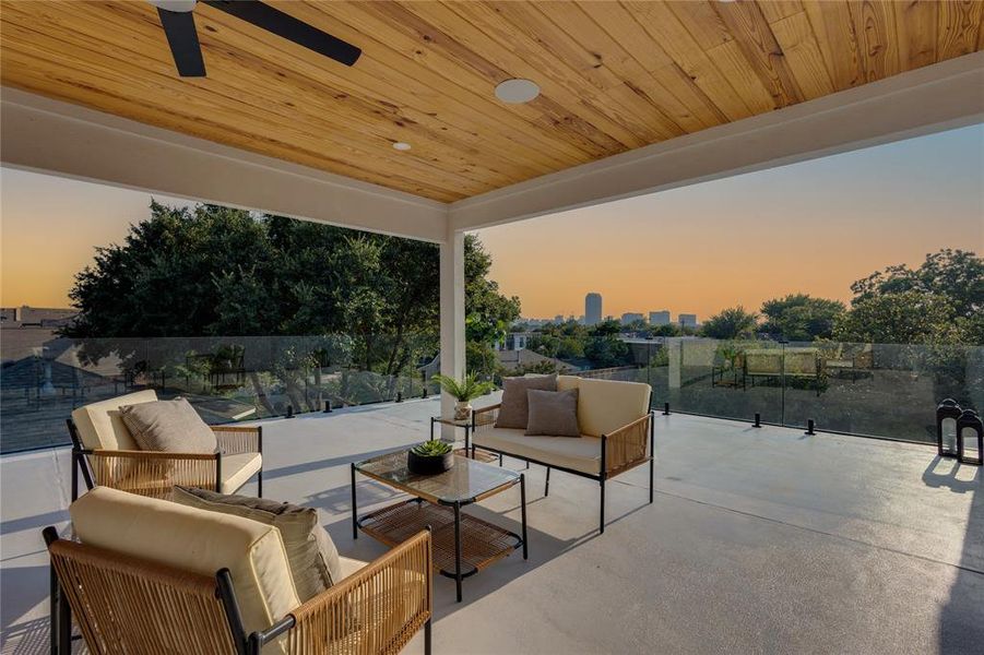 Patio terrace at dusk with outdoor lounge area