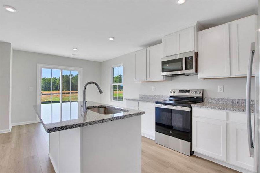 Furnished interior view inside a new home in Aspen Meadows, Hampton (Image 7).