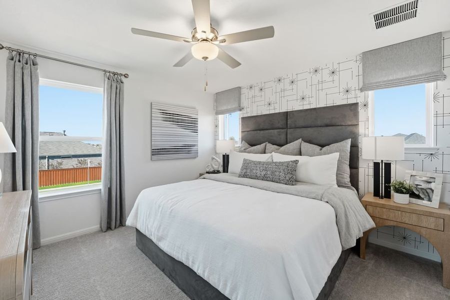 Representative furnished interior of a home built from the Harrier by Taylor Morrison in Village Grove, Dripping Springs (Image 12).