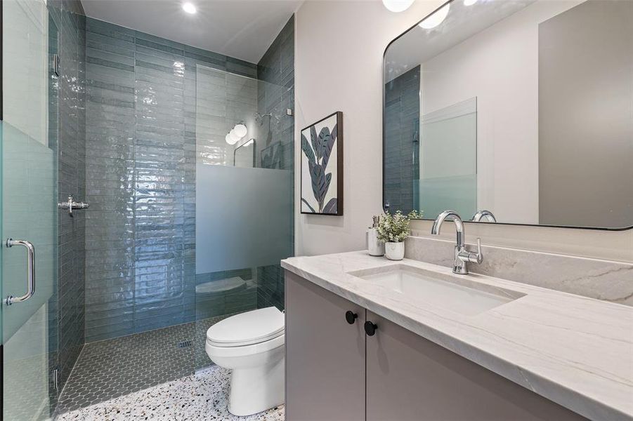 The full bath on the main floor, a testament to modern design, offers a serene escape with stylish fixtures and a thoughtfully designed layout.