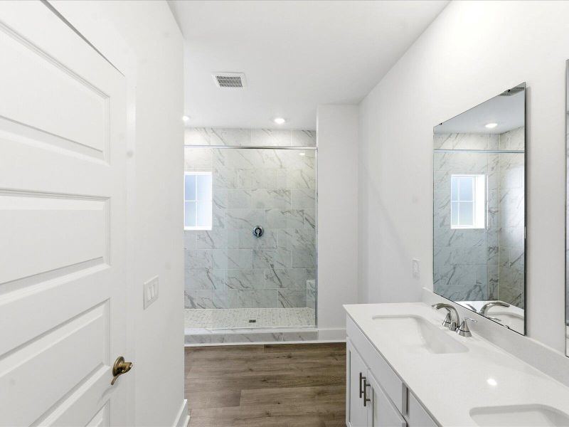 Furnished interior view inside a new home in The Coves at Lakes of Cane Bay II, Summerville (Image 18).