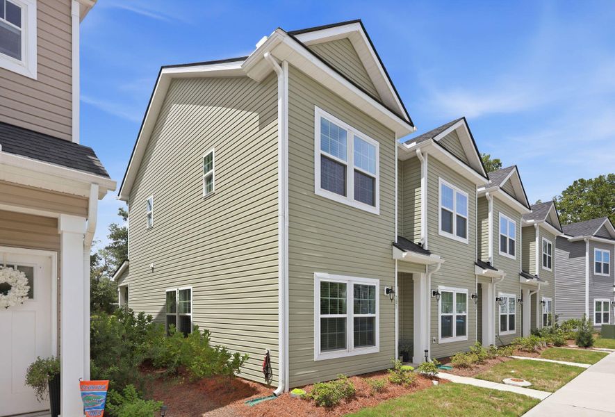 Front exterior of a new home in , Wando, SC, highlighting curb appeal (Image 20).