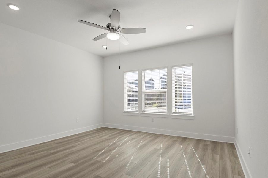Unfurnished room with light wood finished floors, recessed lighting, and ceiling fan Unfurnished room with light wood finished floors, recessed lighting, and ceiling fan