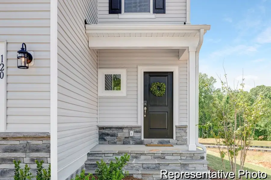 Exterior details and patio area of a home in White Oak Creek Crossing, Angier (Image 1). Exterior details and patio area of a home in White Oak Creek Crossing, Angier (Image 1).