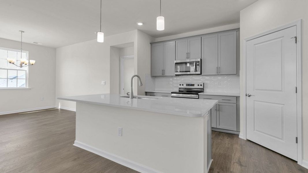 Representative furnished interior of a home built from the BRISTOL by D.R. Horton in The Villas at Galvins Ridge, Sanford (Image 4).