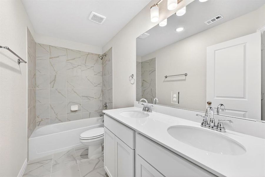 Furnished interior view inside a new home in Lily Creek at Sutton Fields, Aubrey (Image 18). Furnished interior view inside a new home in Lily Creek at Sutton Fields, Aubrey (Image 18).