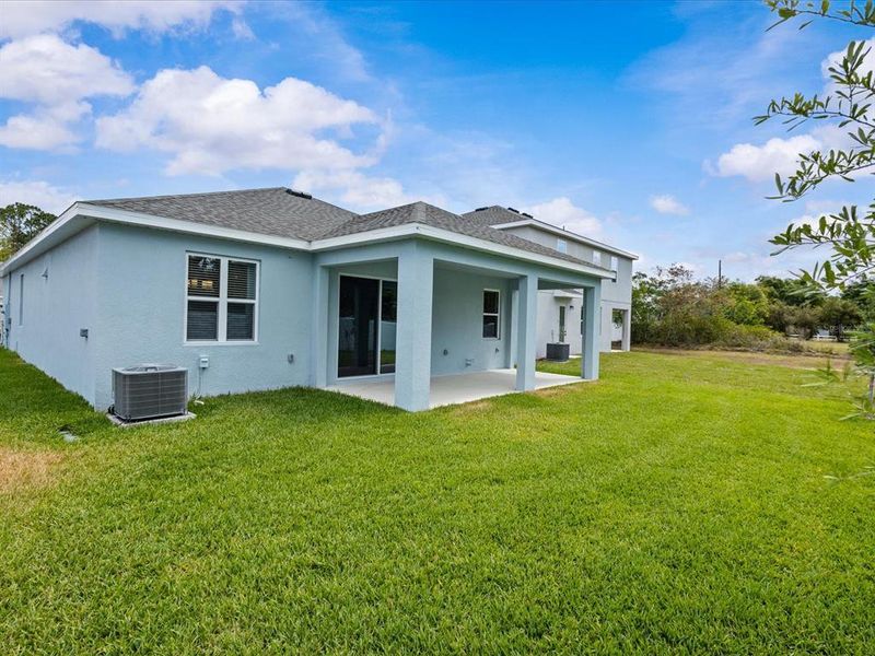 Front exterior of a new home in , Orlando, FL, highlighting curb appeal (Image 2).