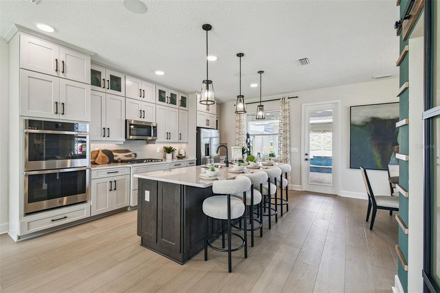 Furnished interior view inside a new home in Lake Star at Ovation, Winter Garden (Image 13).
