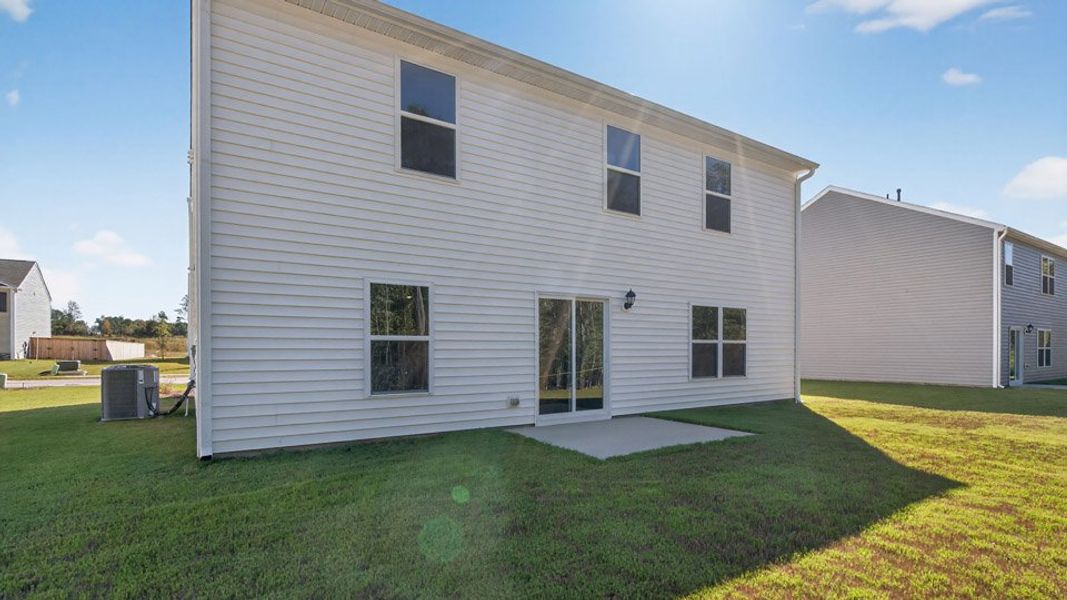 Exterior details and patio area of a home in Olive Branch, Clayton (Image 4).