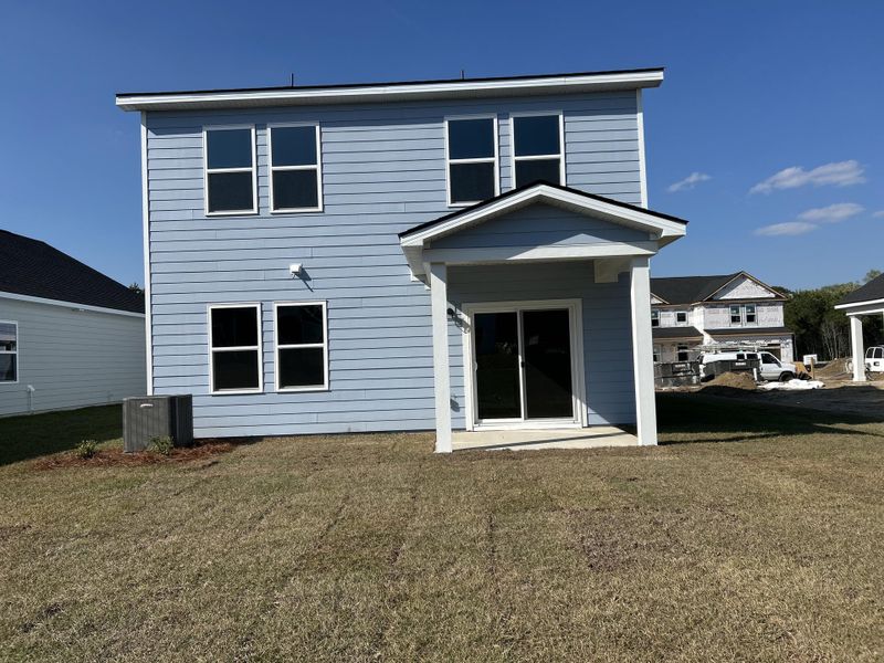 Exterior details and patio area of a home in Tea Farm, Ravenel (Image 11).