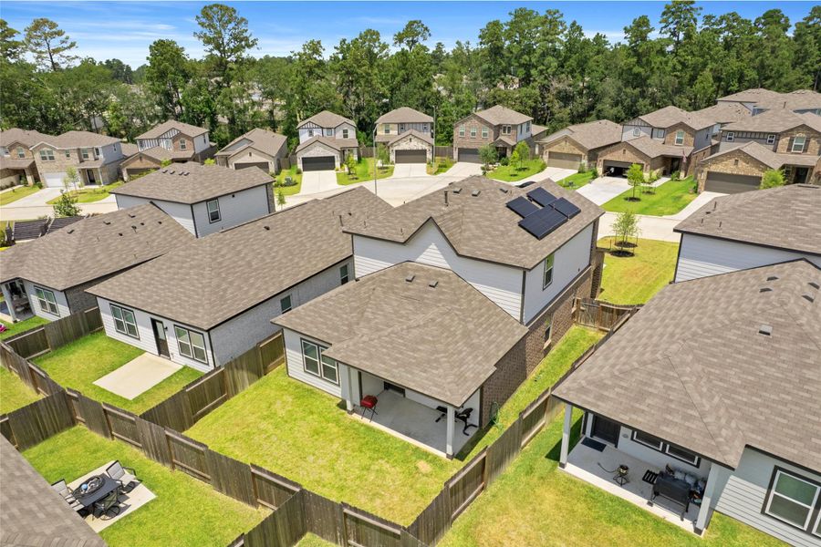 Front exterior of a new home in Lakes at Black Oak, Magnolia, TX, highlighting curb appeal (Image 2).