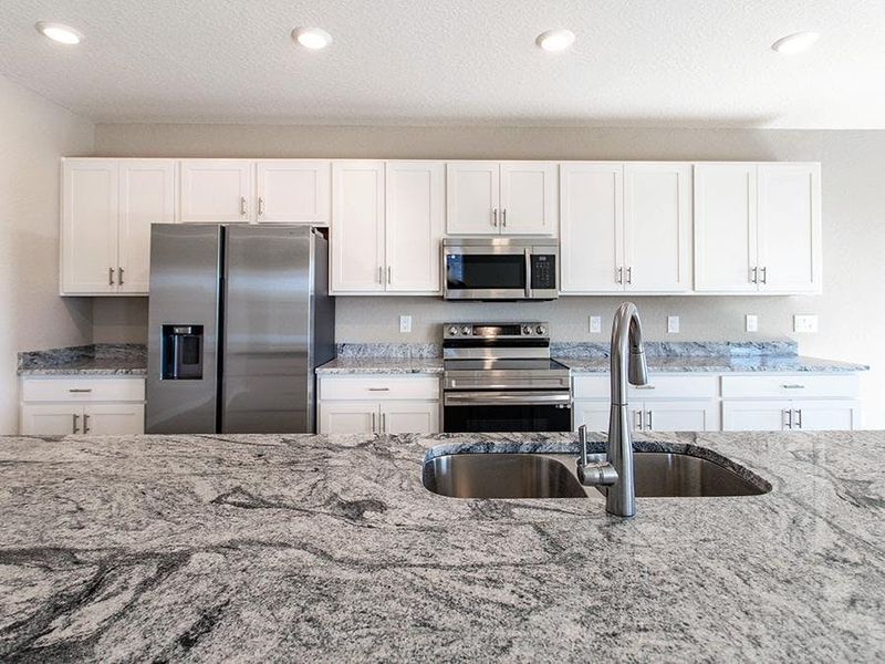 Personalize your dream kitchen with your choice of features and finishes - Westbrooke II by Highland Homes Personalize your dream kitchen with your choice of features and finishes - Westbrooke II by Highland Homes