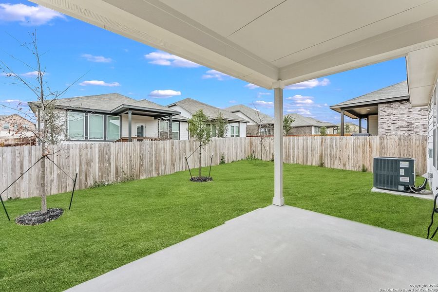 Exterior details and patio area of a home in Bricewood, San Antonio (Image 4).