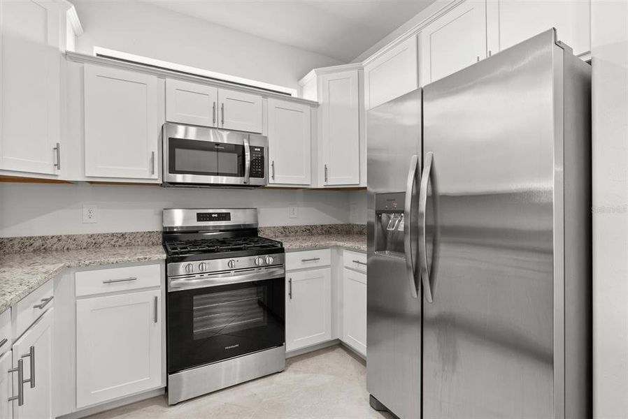 Furnished interior view inside a new home in Lorraine Lakes at Lakewood Ranch, Lakewood Ranch (Image 5).