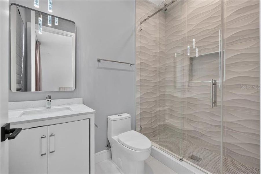 Furnished interior view inside a new home in , Redington Shores (Image 40).