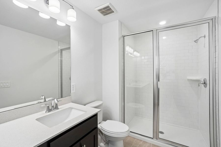 Primary bathroom with a large walk-in shower