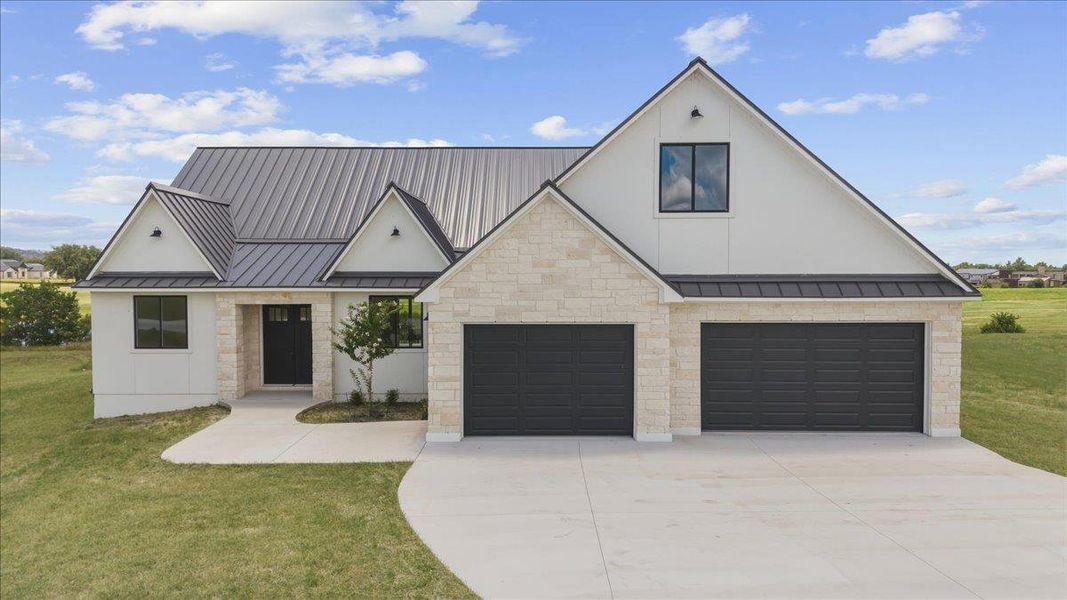 This classic Hill Country modern home features high-end construction and finishes, plus a three-car garage. This classic Hill Country modern home features high-end construction and finishes, plus a three-car garage.