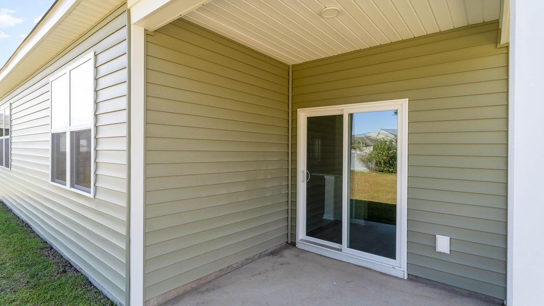 Exterior details and patio area of a home in Pinewood Estates, Conway (Image 2).