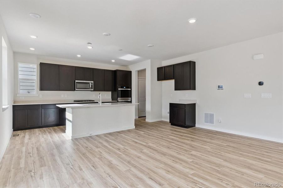 Spacious, unfurnished interior of a new home in Floret Collection at Parkdale Commons, Lafayette (Image 13).